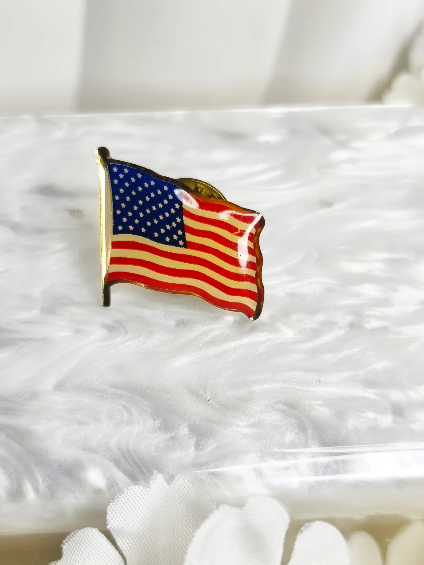American gold tone and enamel flag pin brooch