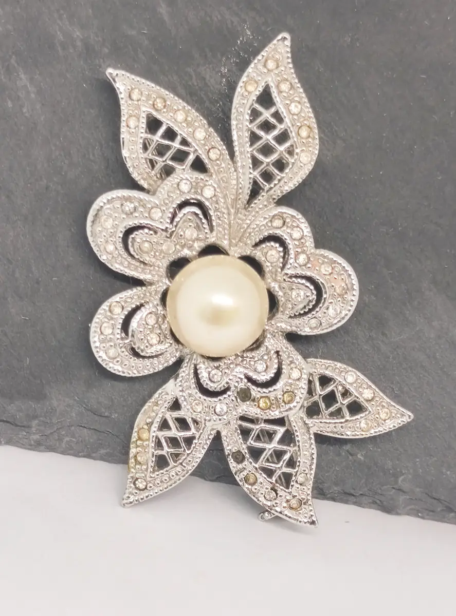 Silver tone with faux pearl flower brooch