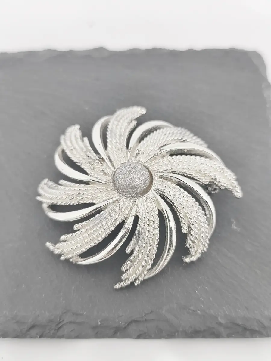 Vintage Sarah Coventry swirl pin wheel brooch