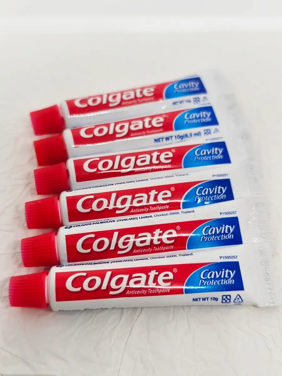 6 sealed mini Colgate travel toothpastes 10g