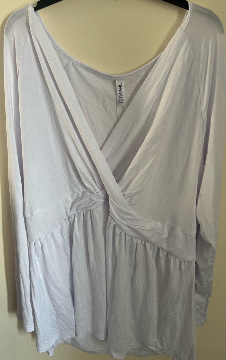 Tianzhu cross over style top