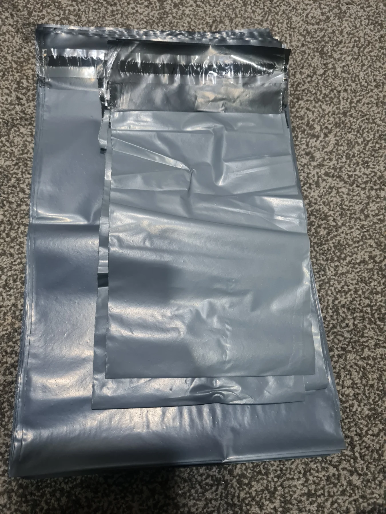 Two mixed size 200 postage bags