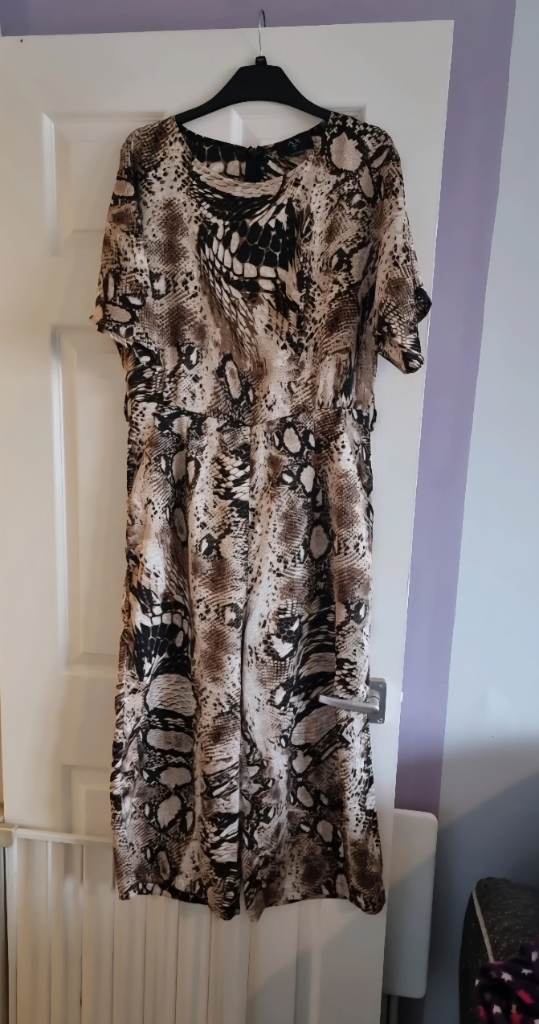Womens jumpsuit. Size 12-14