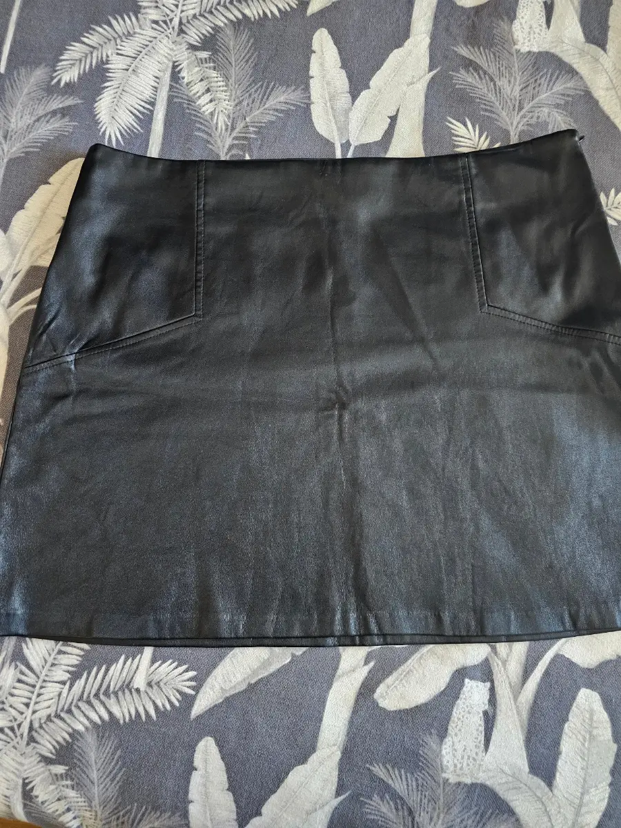 Black faux leather mini skirt