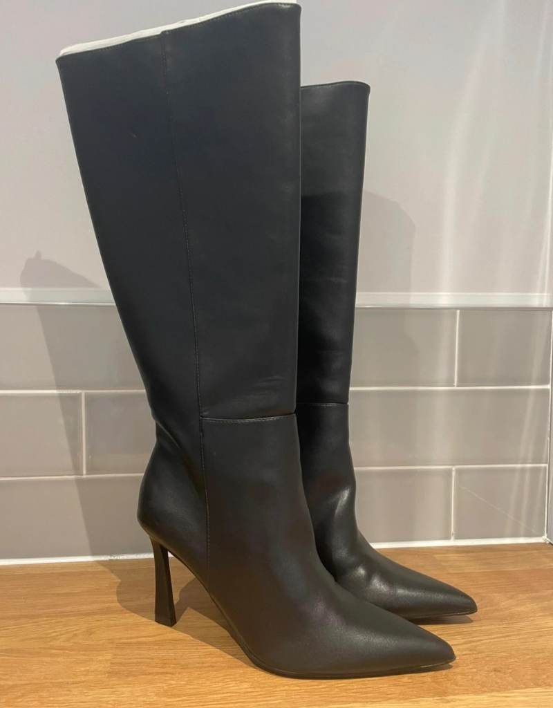 Knee length black boots