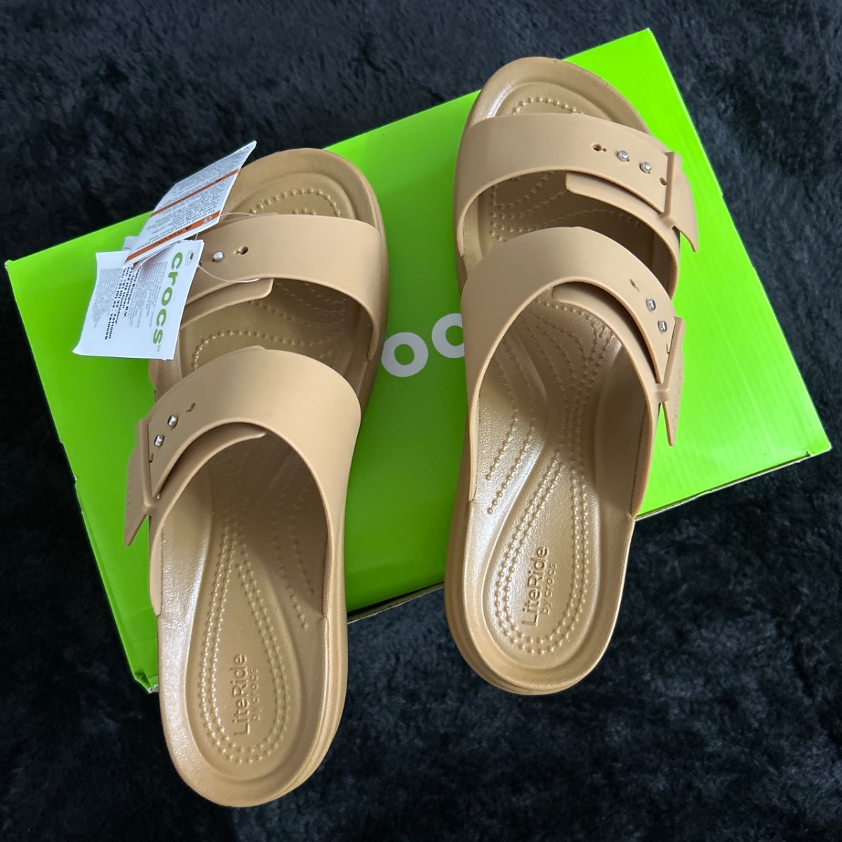 Crocs Brooklyn Buckle Low Wedge sandals latte brown color.