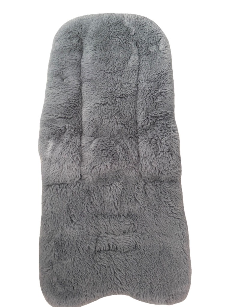 Grey faux fluffy buggy liner provides universal fit comfort