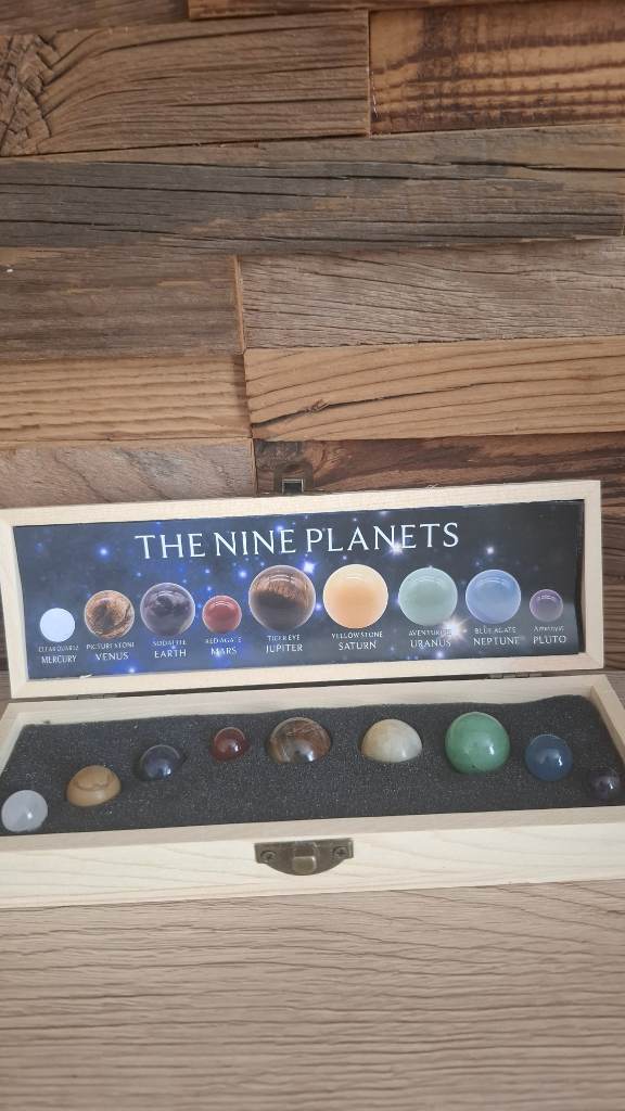 The nine planets stones in wooden box