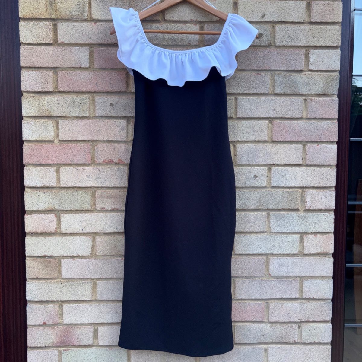Size Small black dress with white ruffle