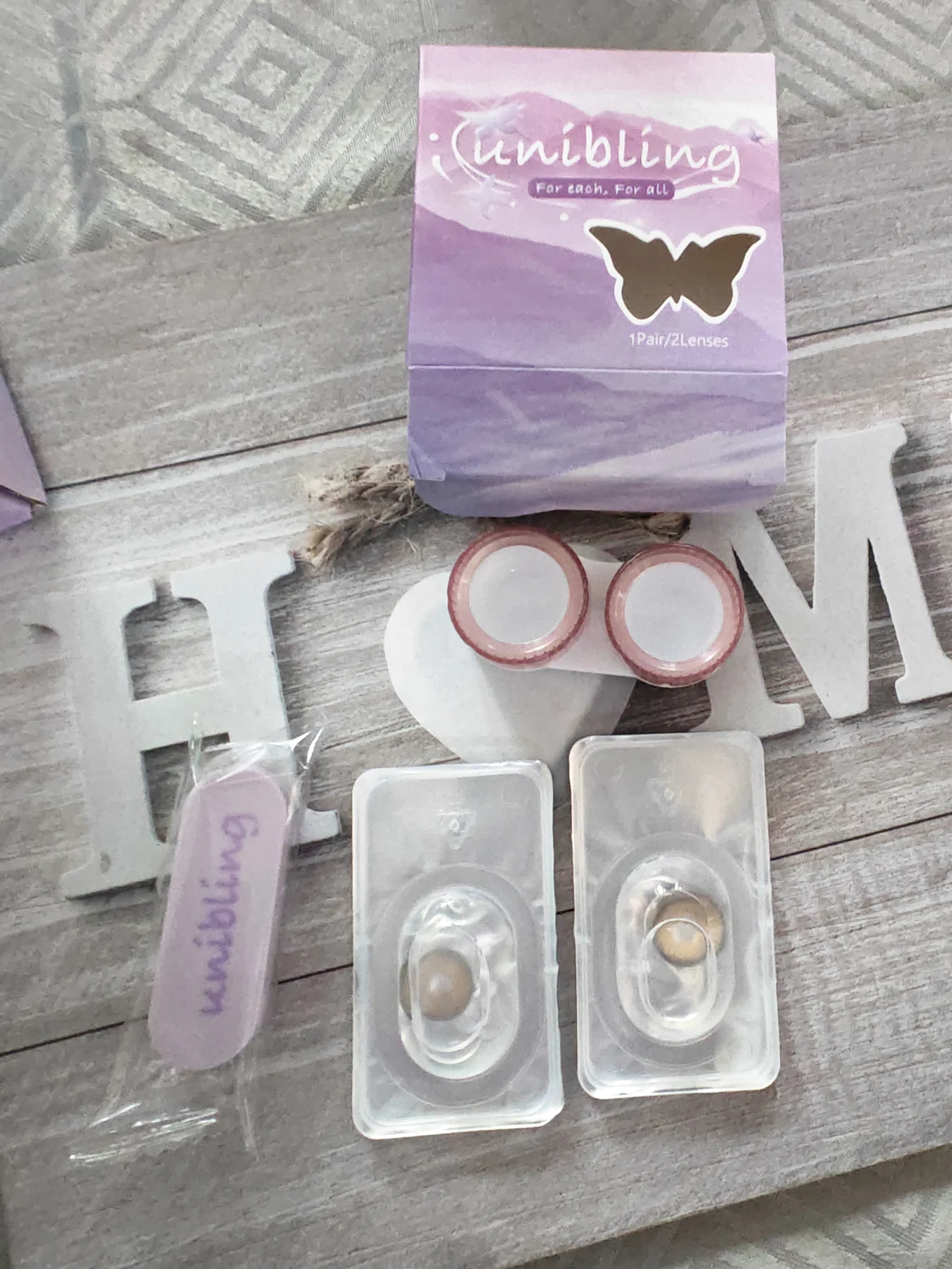 Unibling Sandy Twilight colored contact lenses featuring a golden-brown or hazel shade.
