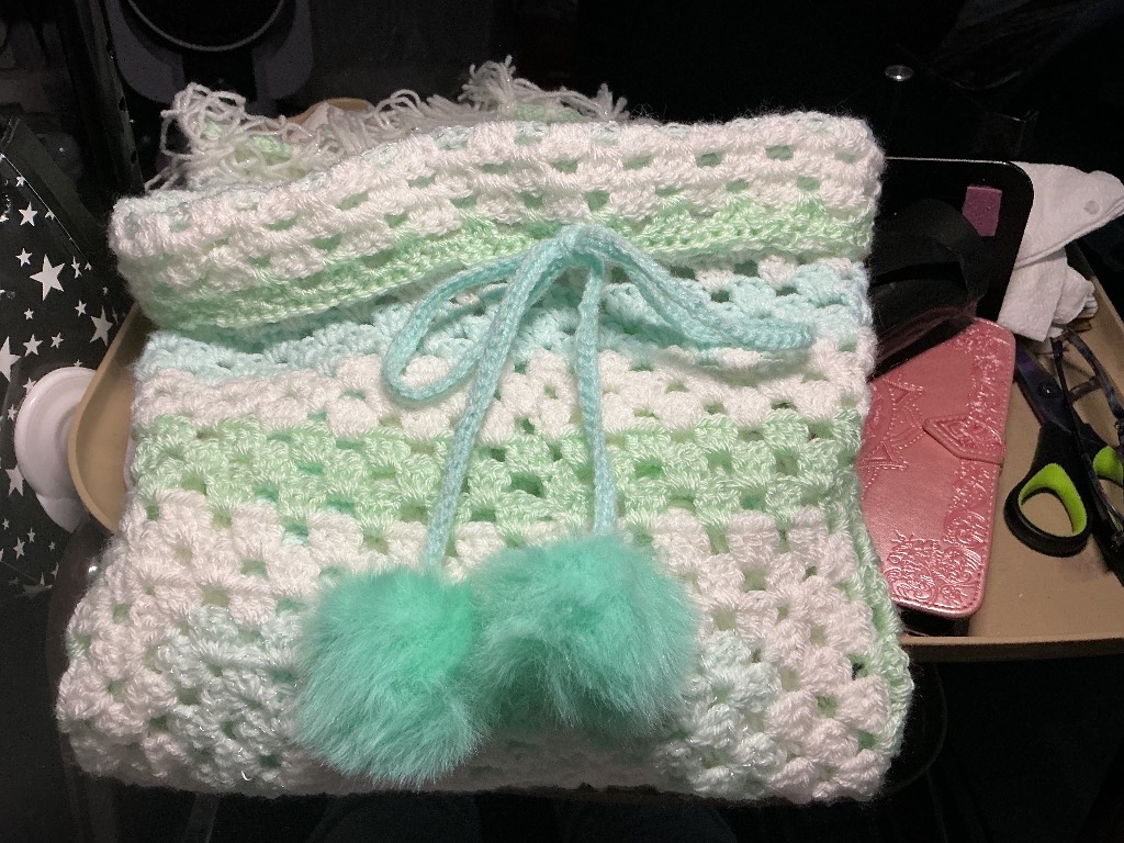 Handmade crochet pram blanket