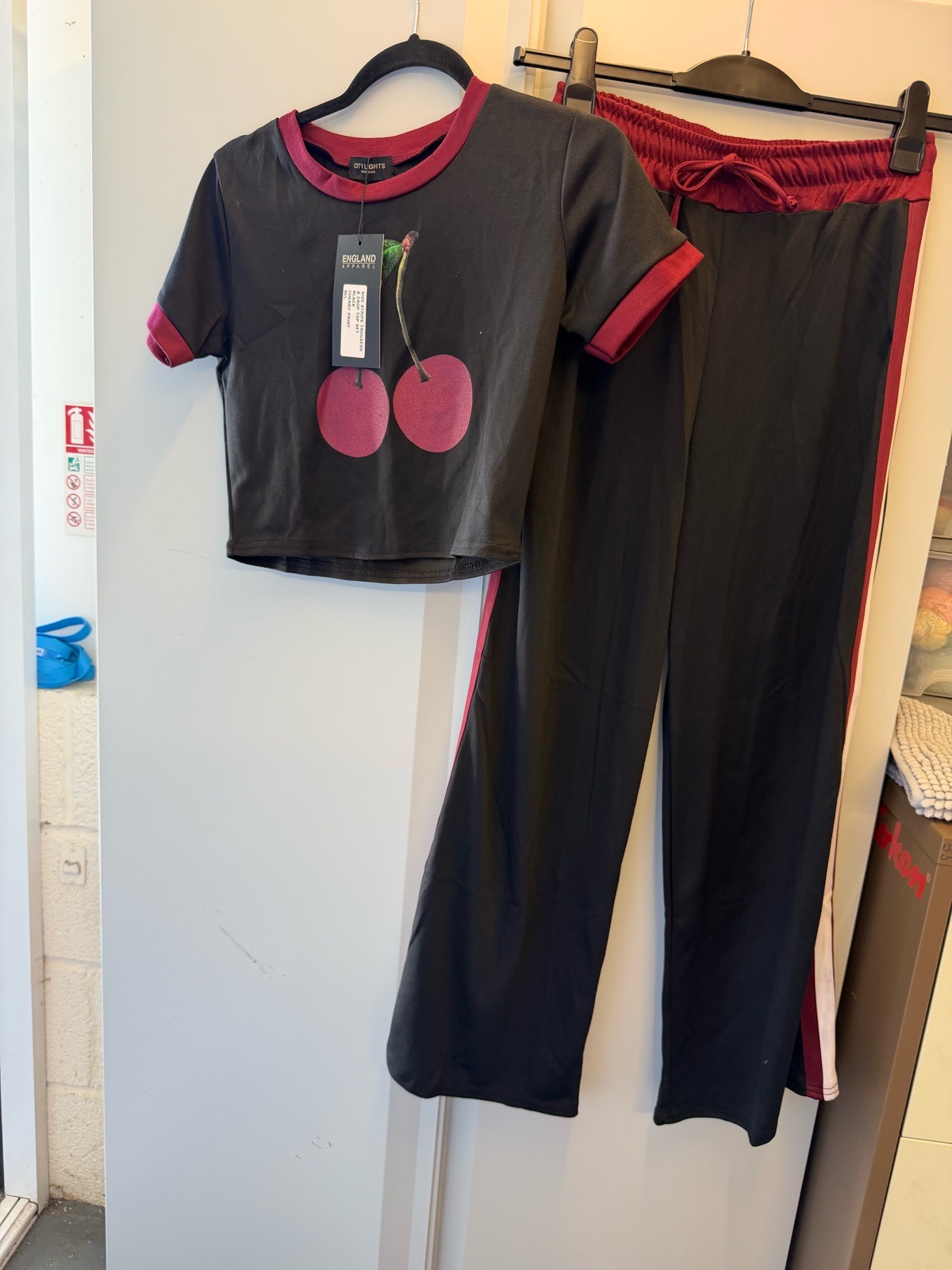 Cherry Graphic Ribbed Crop Top & Wide Leg Trouser Co-ord from the brand City Lights, featuring a Br
