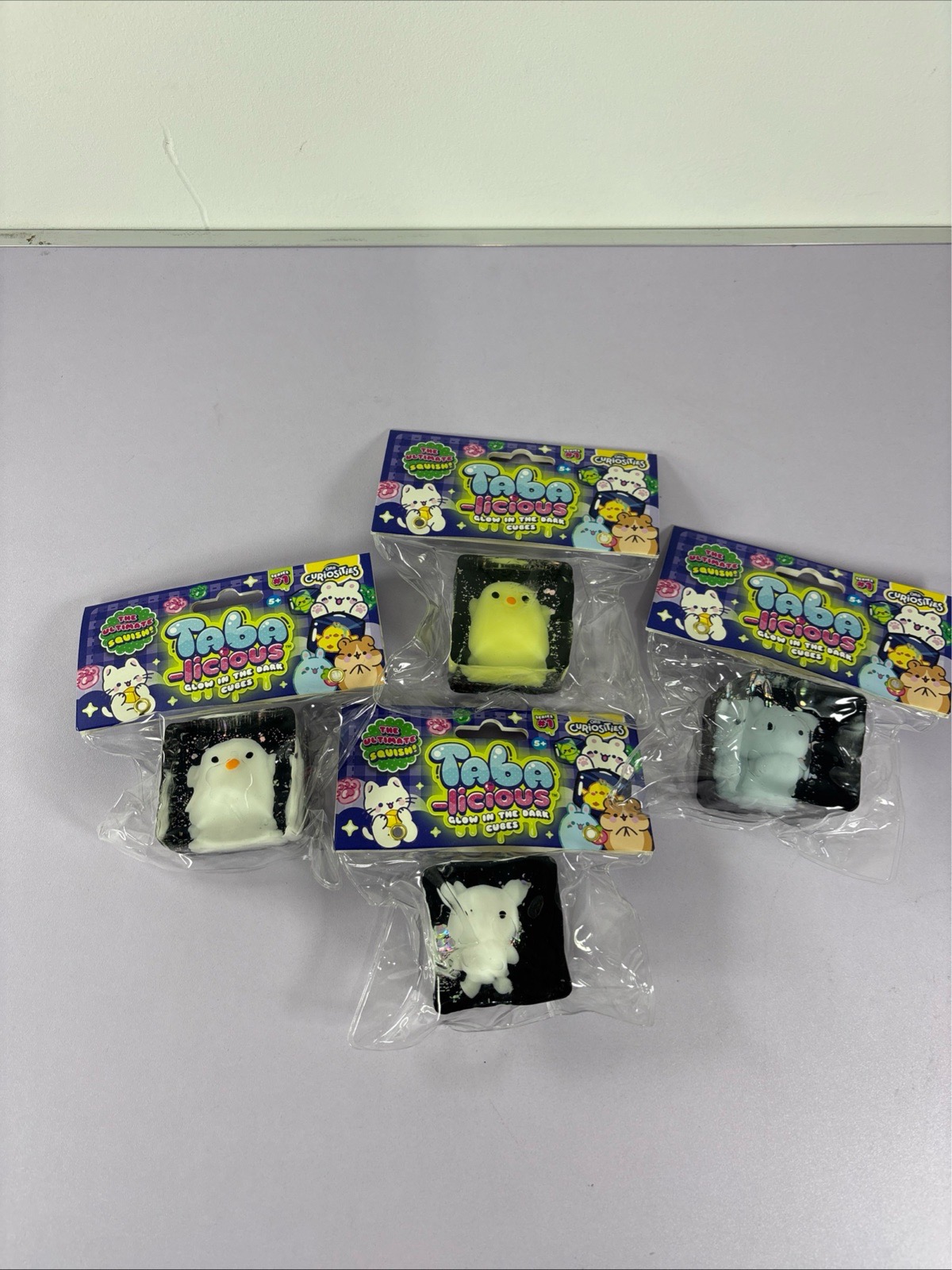 Orb Curiosities Tabalicious Glow In Dark Cube  Squishy Sensory Toy bundle of 4