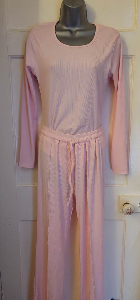 Pink trousers and bodysuit set