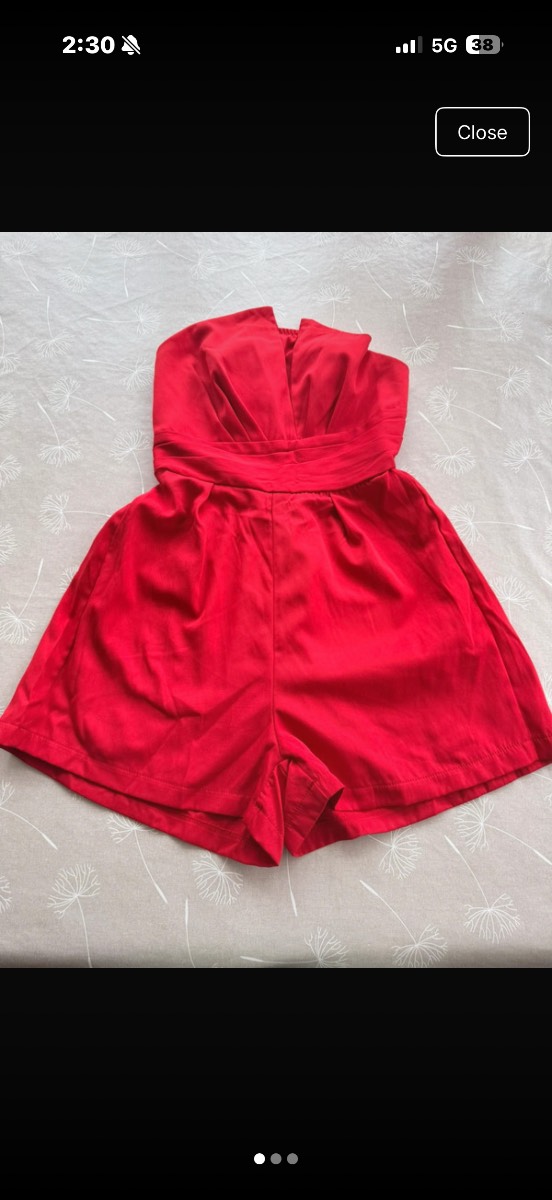 Red strapless playsuit