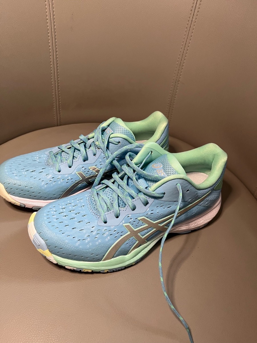 Brand new asics size 4
