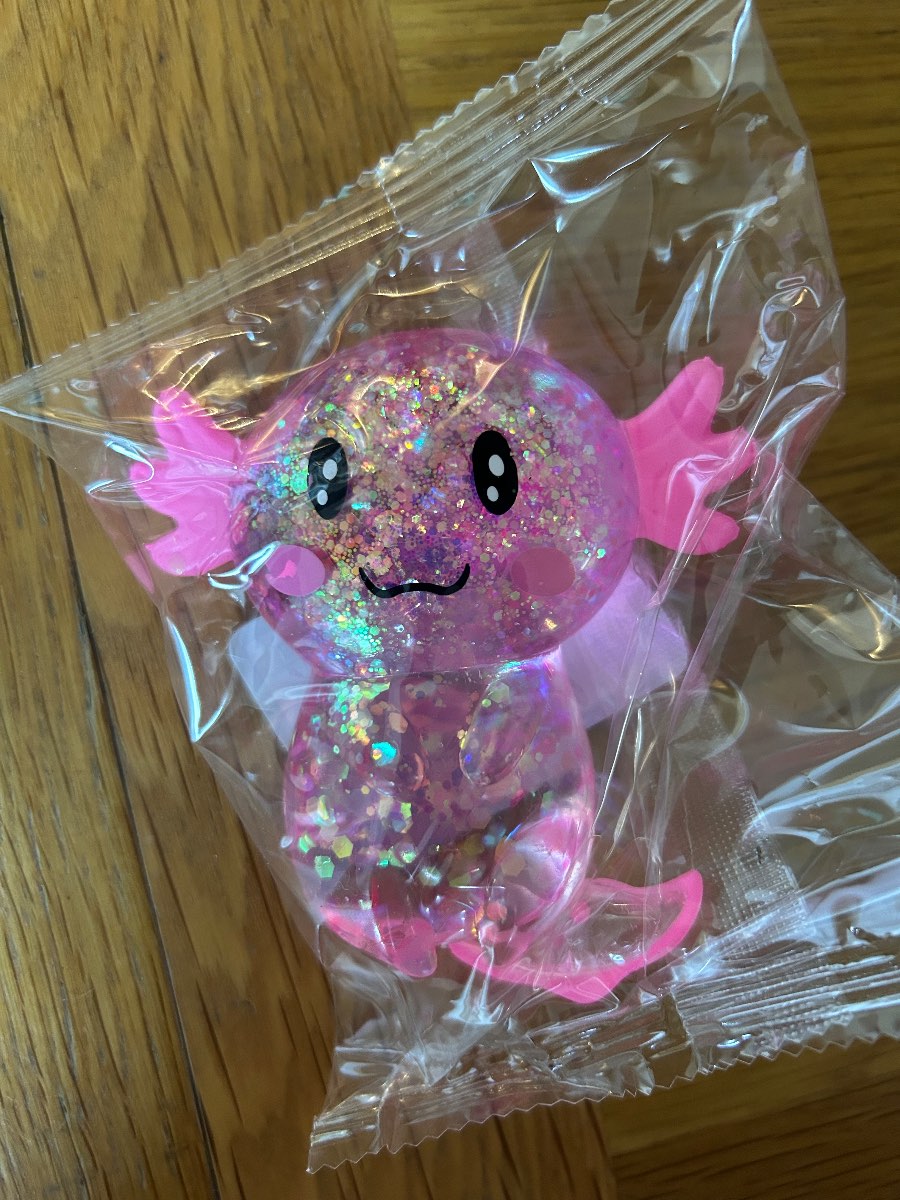 Brand new- pink squishy stretchy sugar Axolotl fidget toy.