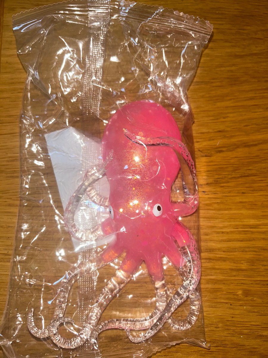 Brand new- pink squishy squid fidget toy
