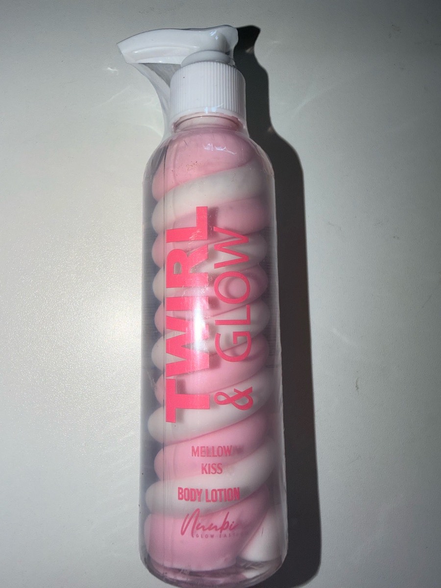 Brand new- twirl and glow mellow kiss scented body lotion in pump bottle and lovely design