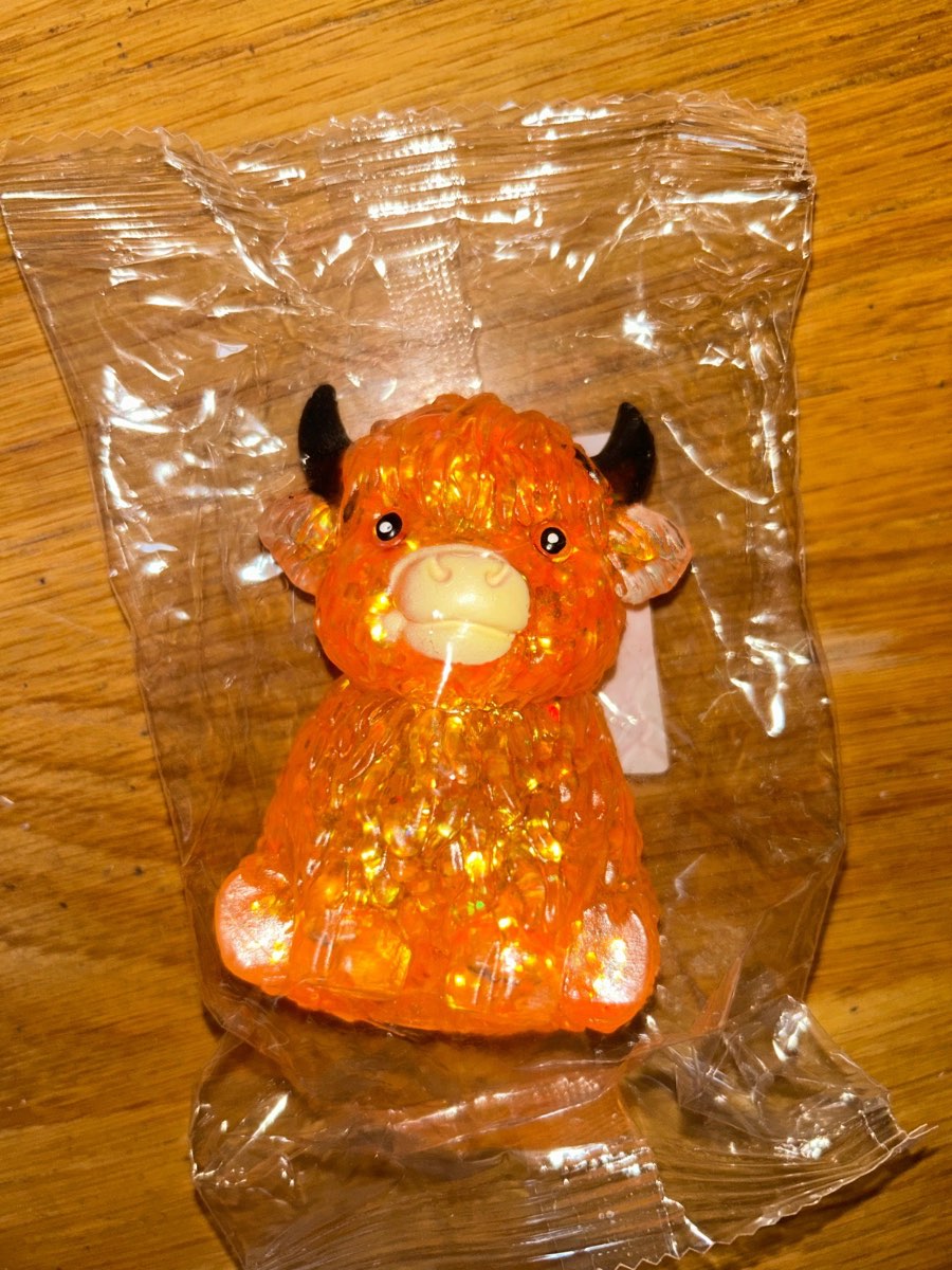 Brand new- Orange squishy highland cow cute fidget toy
