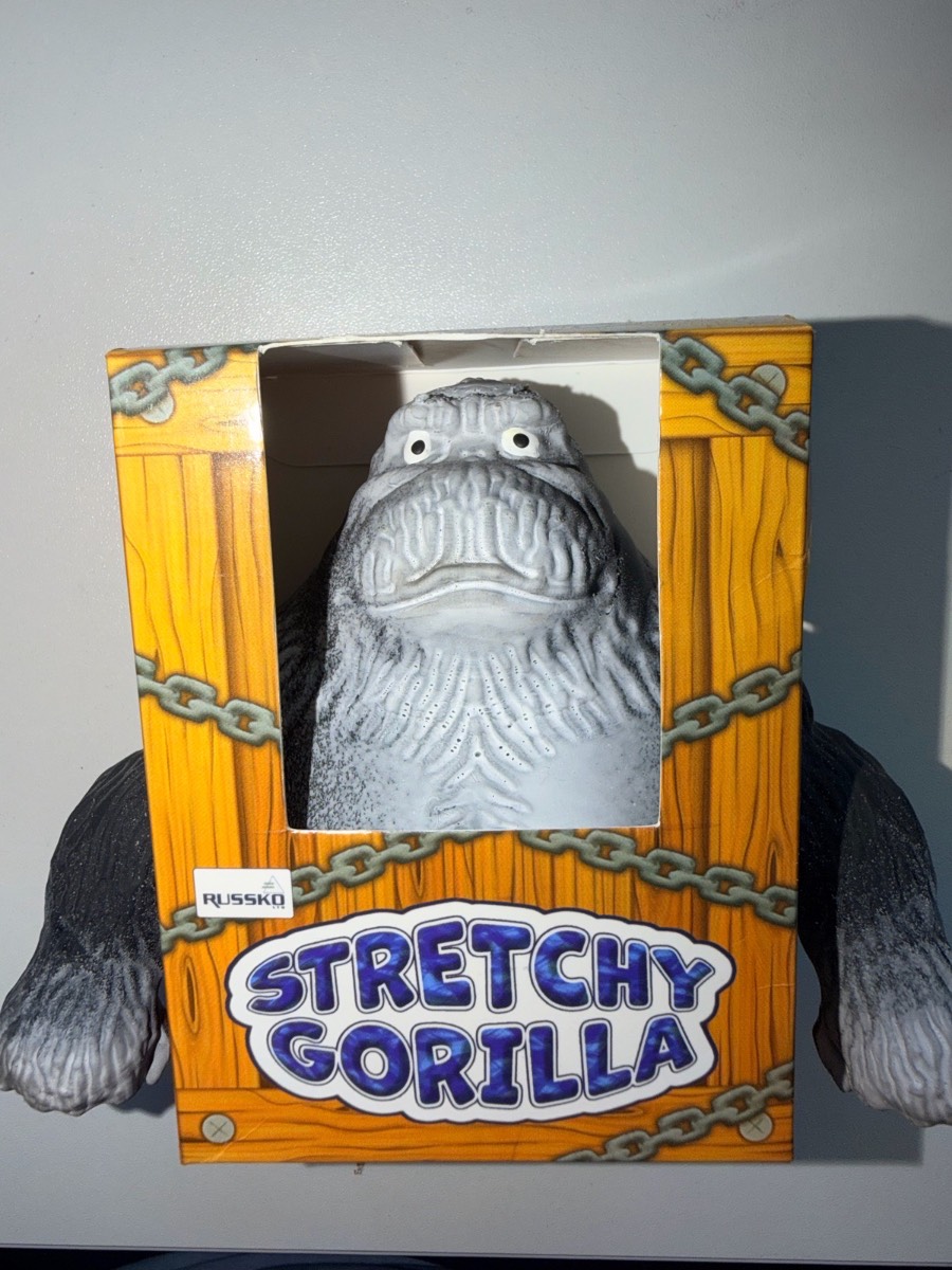 Brand new- grey stretchy gorilla fidget toy. Stretches up to 3 times its size