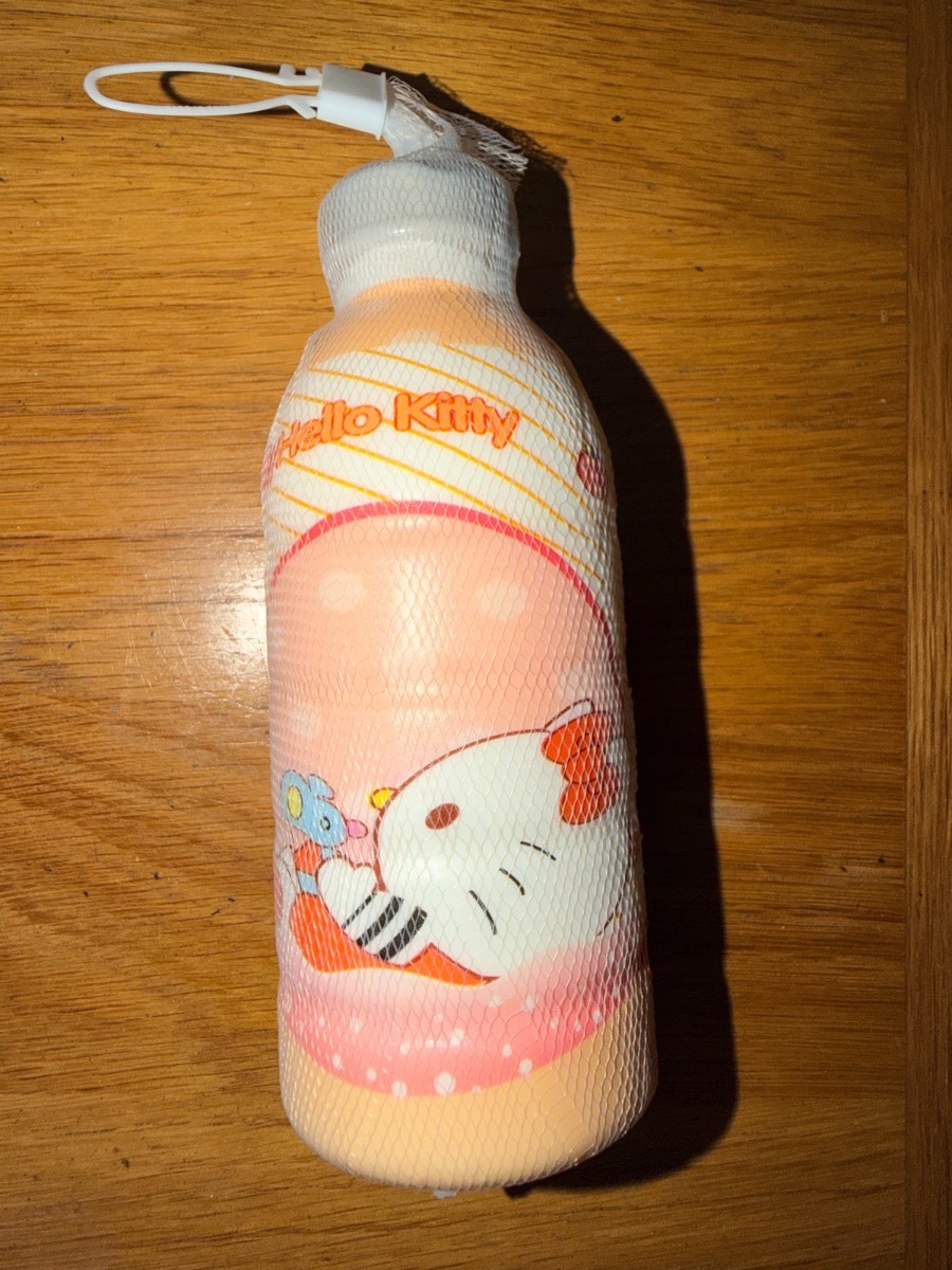 Brand new- hello kitty slow rise squishy milk bottle fidget toy