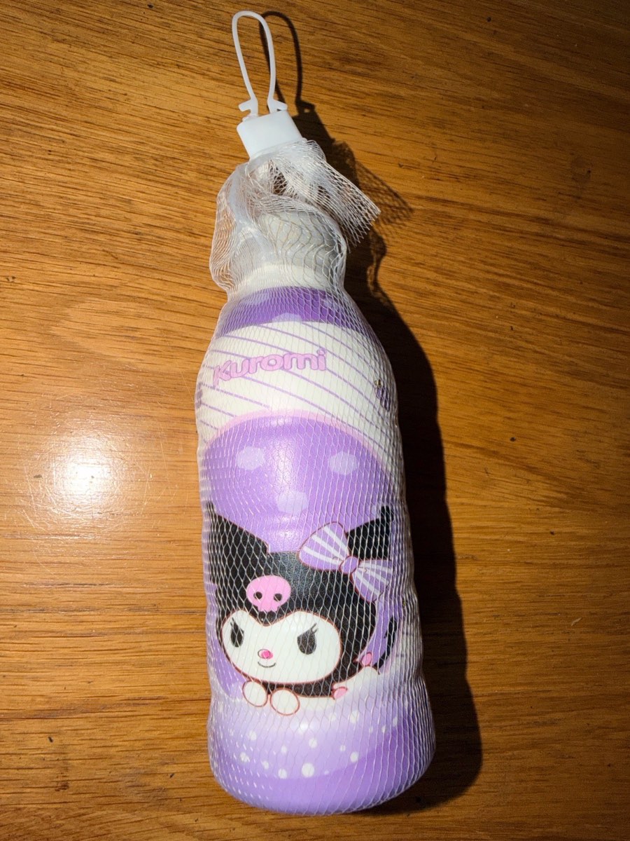 Brand new- Kuromi purple and white slow rise squishy milk bottle fidget toy