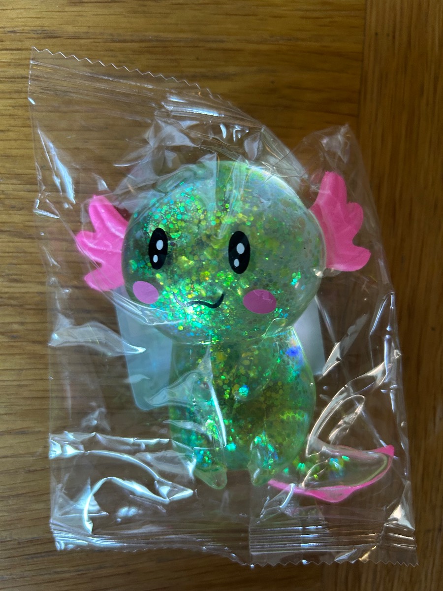 Brand new- green squishy stretchy sugar Axolotl fidget toy.