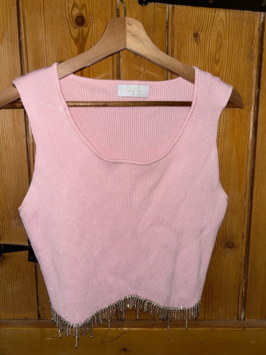 Quiz size large light pink crop stop with glitzy sparkly beaded detail