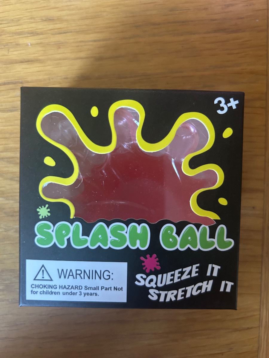 Brand new- red/pinky jelly splash ball fidget toy