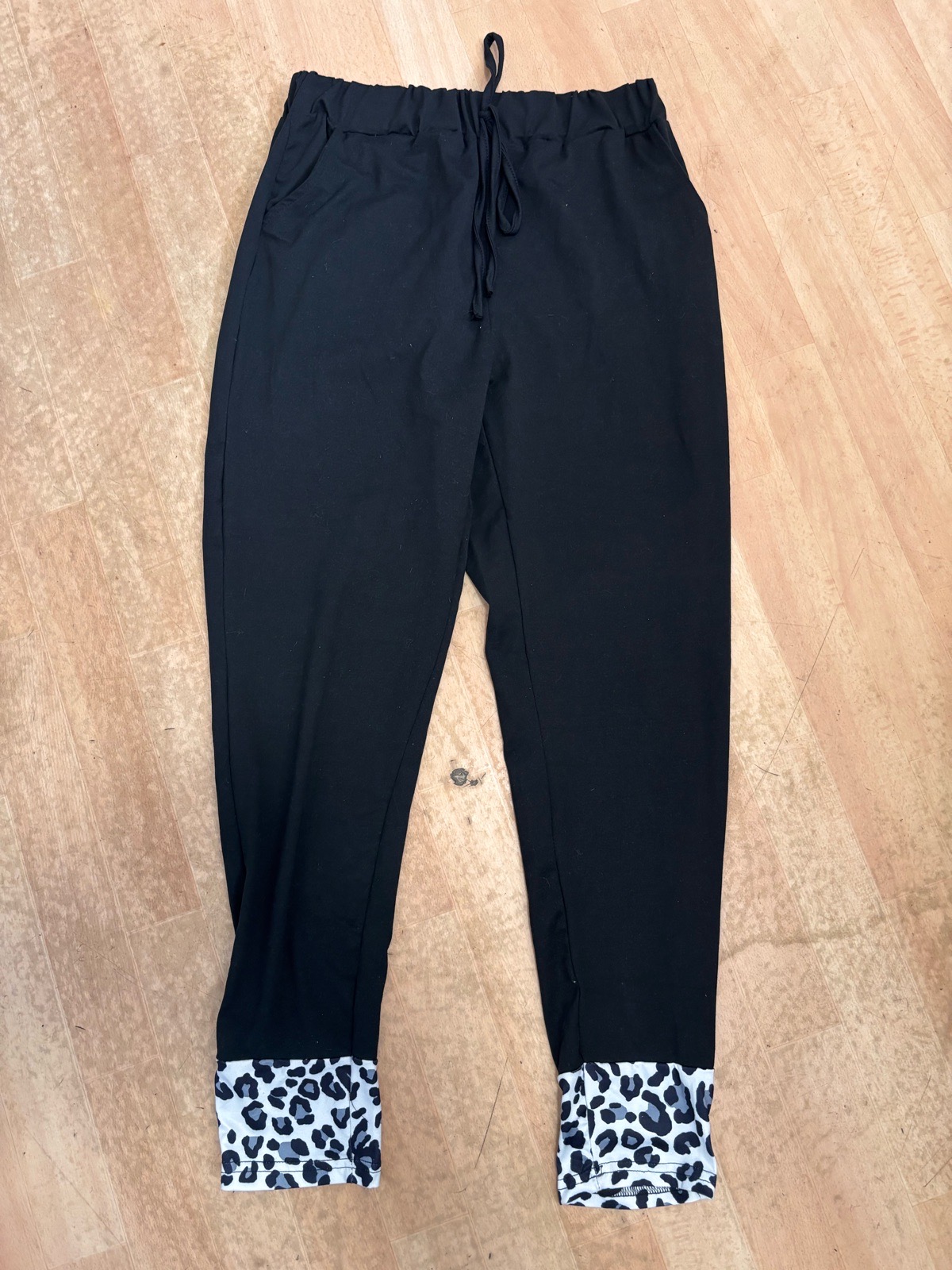 Ladies black jogging bottoms with animal print trim - size medium