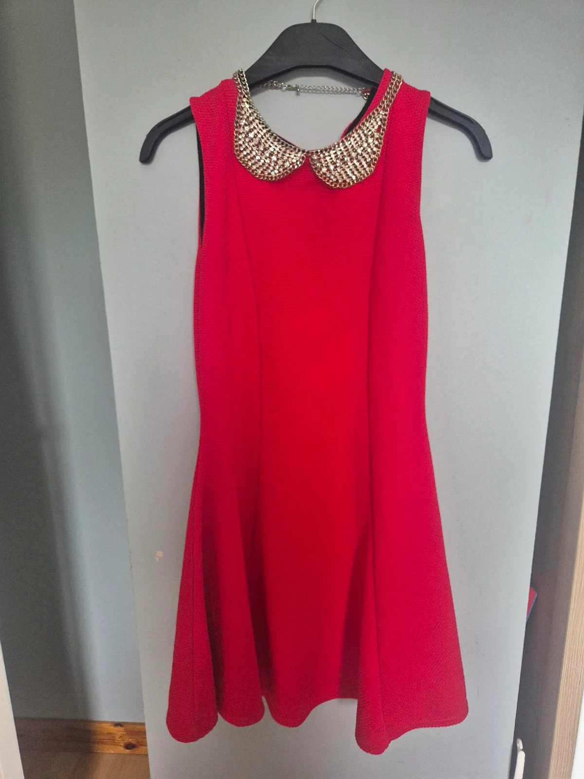Red sleeveless fit-and-flare mini dress with metallic beaded Peter Pan collar, size 12