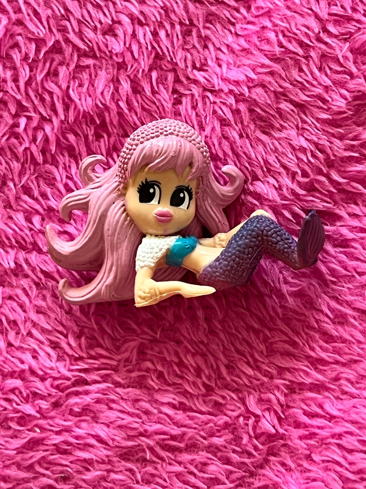 Cute small mermaid figurine