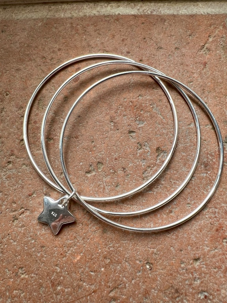 Triple bangle bracelet with a 925 star charm