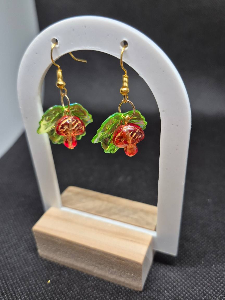 Green acrylic leaves with red toadstools