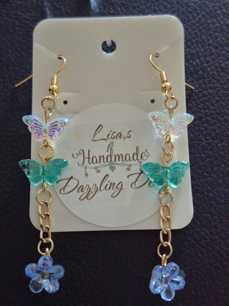 Acrylic butterflys with a flower droplet
