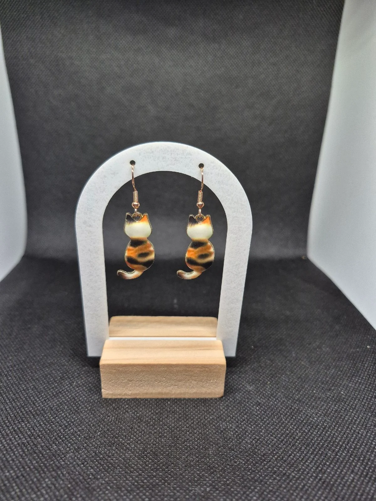 Orange and balck cat shaped earrings