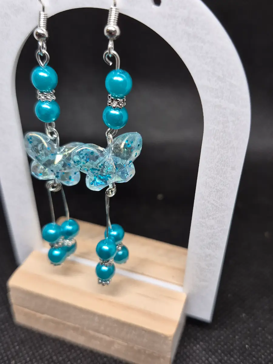 Blue spec butterfly earrings