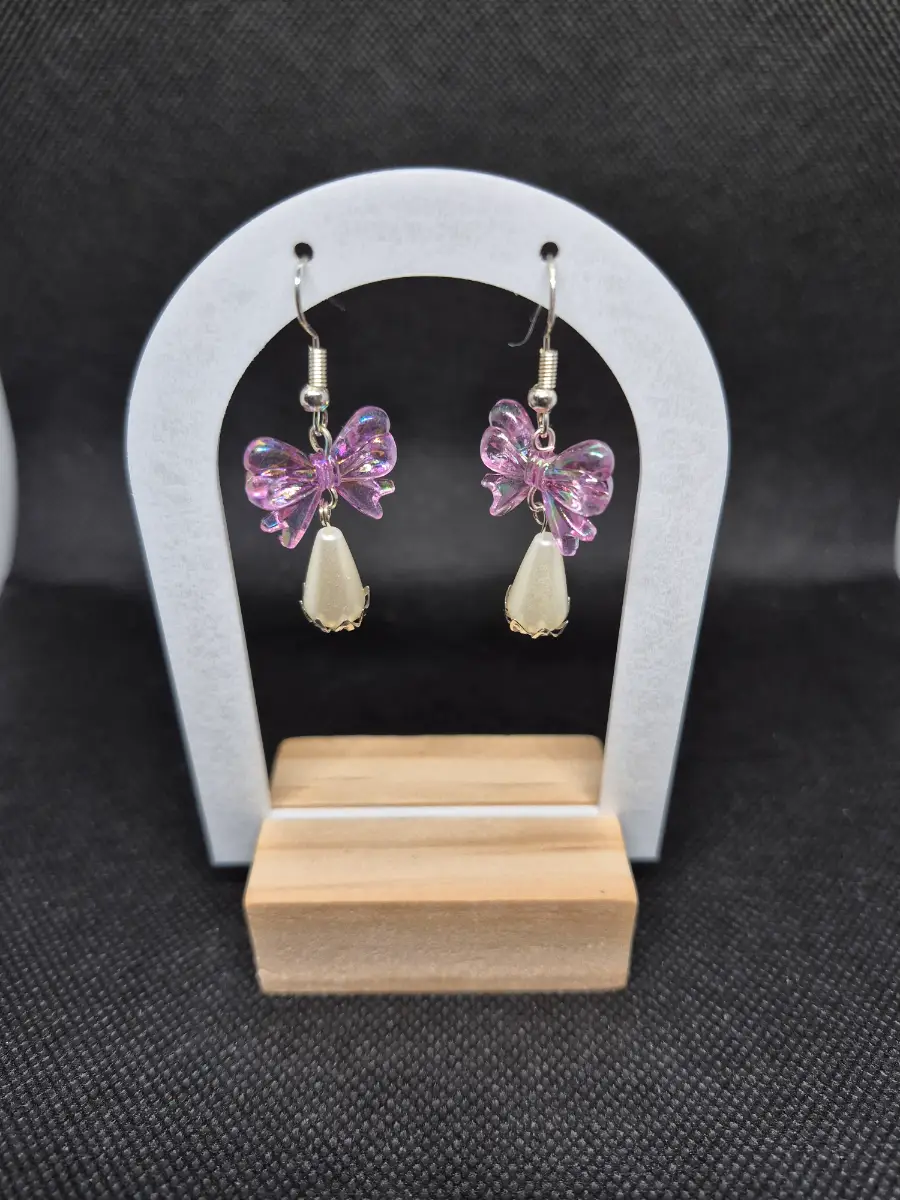 Pink bows and pearl droplets