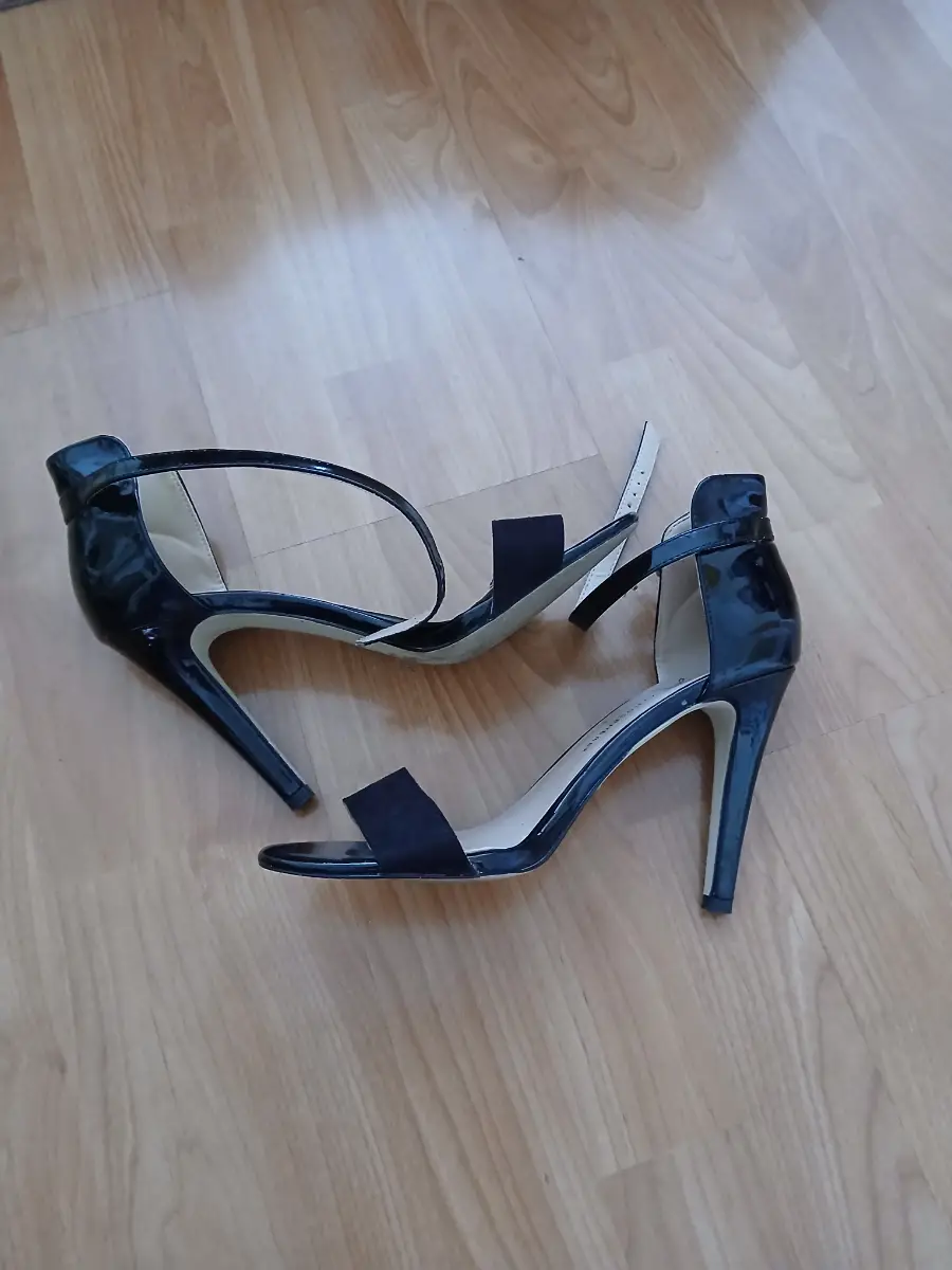 Black strapping heeled sandals