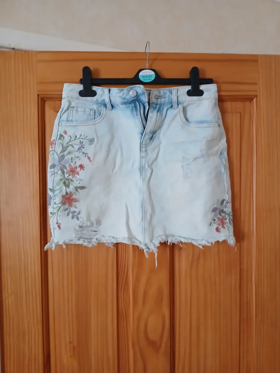 Denim mini skirt with floral print