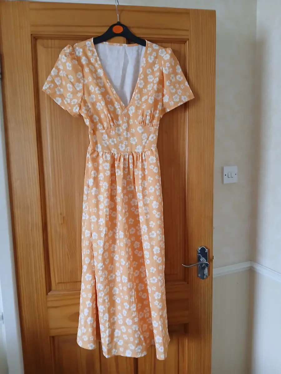 Orange dress with flower pattern