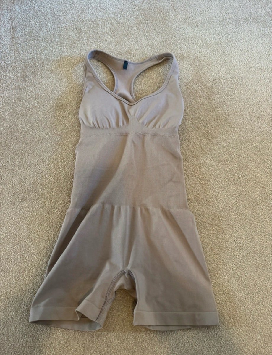 Bo+tee oh polly racer back define luxe unitard gym playsuit open back brown beige