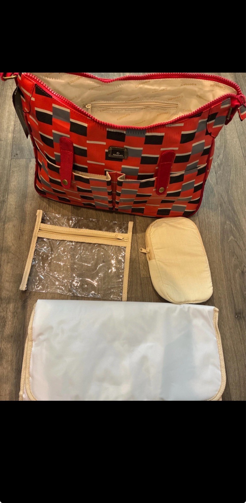 Baby changing bag with mat and bottle warmer