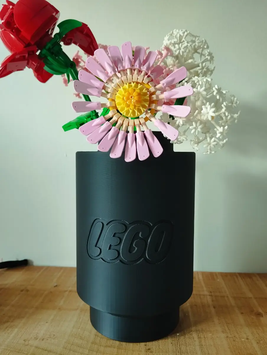 3d printed Lego themed vase in a black filament