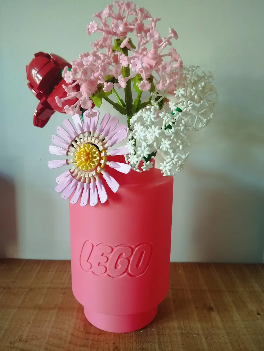3d printed Lego themed vase in a pink filament
