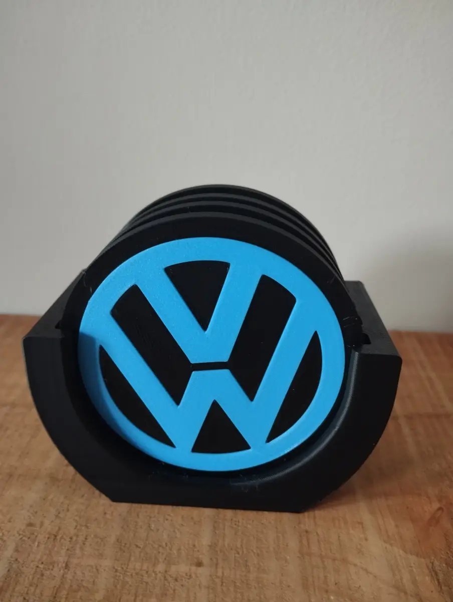 3d printed VW themed coasters and coaster holder in a blue and black filament.