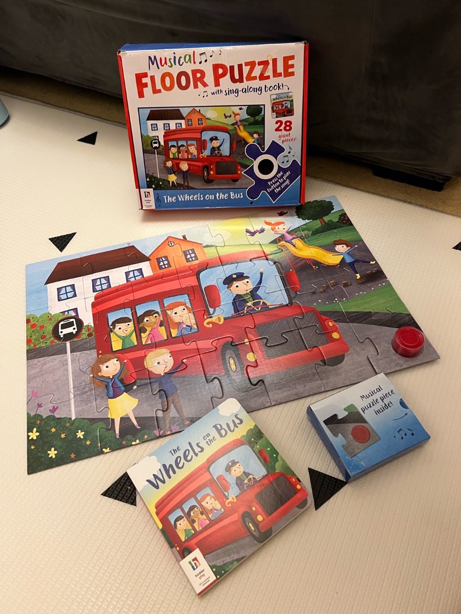 Musical Floor 28-Piece Puzzle with Sing-Along Book The Wheels on the Bus