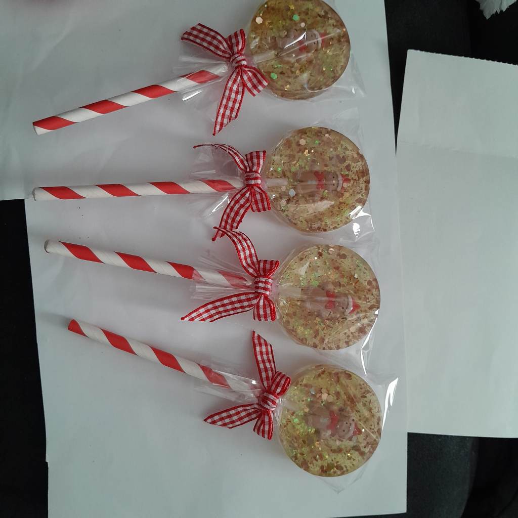 Resin gingerbread faux lollies. Not for consuming. Decoration  only