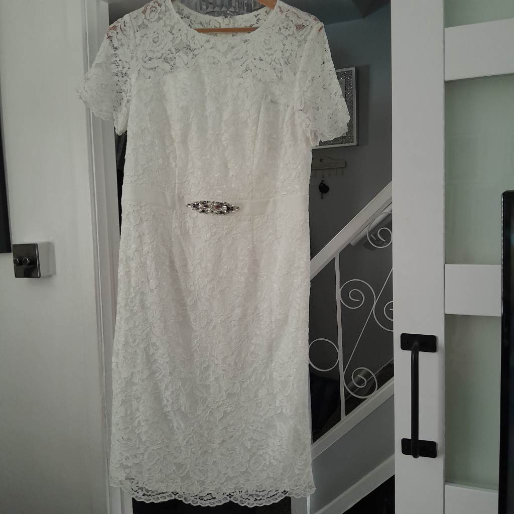 Lined laced white / cream nightingales dress.